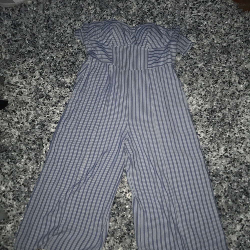 a blue and white striped romper.